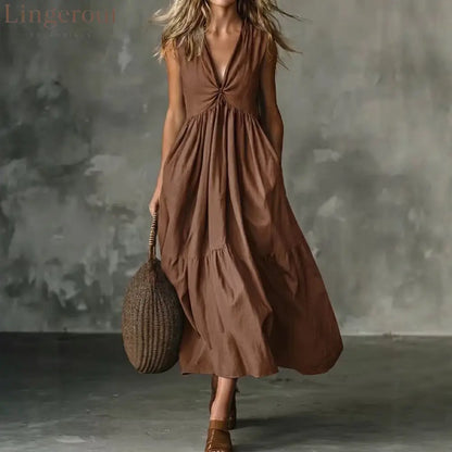 Twist Front V-Neck Sleeveless Pocket Textured Flowy Maxi Dress