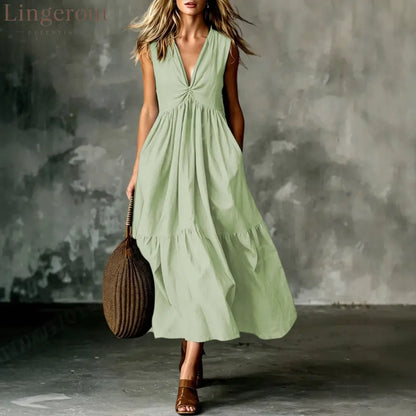 Twist Front V-Neck Sleeveless Pocket Textured Flowy Maxi Dress